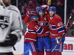 Montreal Canadiens defenseman Shea Weber (6) reacts with teammates including Max Domi (13) and Joel Armia (40) after scoring a goal against the Los Angeles Kings during the first period the Montreal Canadiens at the Bell Centre.