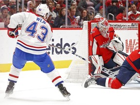 Washington Capitals goaltender Ilya Samsonov makes a save on Montreal Canadiens' Jordan Weal  in the second period at Capital One Arena on Nov. 15, 2019.