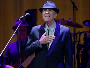 Montreal native Leonard Cohen acknowledges cheers of the crowd as he takes the stage for his concert at the Bell Centre in Montreal on Nov. 28, 2012.