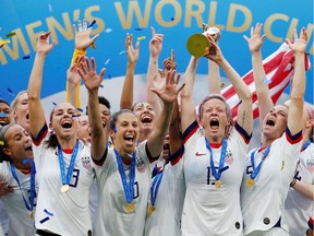 Megan Rapinoe of the U.S. and teammates celebrate winning the women's world cup.