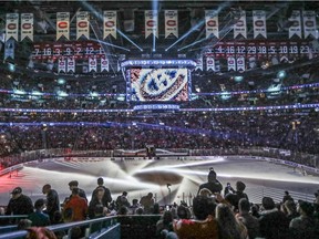 Canadiens fans watch light show prior to Game 1 of the first round of the NHL playoffs against the New York Rangers in Montreal on April 12, 2017.