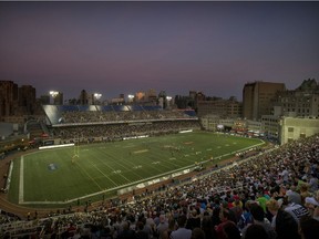 Fans watch the Montreal Alouettes take on the Hamilton Tiger-Cats in Montreal on July 4, 2019.