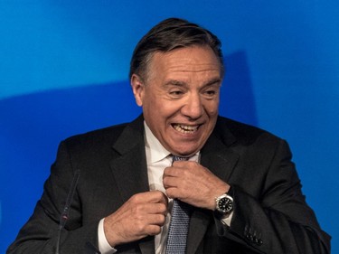 Coalition Avenir Québec leader François Legault celebrates a majority government at his party's election night headquarters in October 2018.