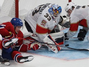Montreal Canadiens' Artturi Lehkonen (62) tries to reach for the puck near Florida Panthers goaltender Sam Montembeault and Keith Yandle (3) during the third period of an NHL exhibition game in Montreal on Thursday September 19, 2019.