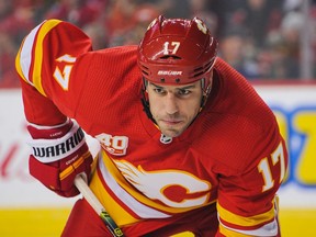 Flames forward Milan Lucic gets ready for faceoff during an NHL game against the Vancouver Canucks at Calgary's Scotiabank Saddledome on Oct. 5, 2019.