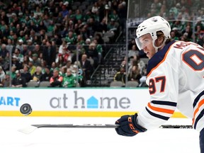 Edmonton Oilers'Connor McDavid skates the puck during a stoppage of play against the Dallas Stars at American Airlines Center on Dec. 16, 2019, in Dallas.