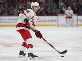 Sebastian Aho of the Carolina Hurricanes looks for an opening against the Colorado Avalanche in the third period at the Pepsi Center on Dec. 19, 2019, in Denver,.