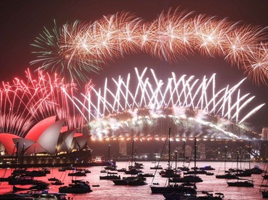 Fireworks explode over the Sydney Harbour Bridge and the Sydney Opera House in the midnight display during New Year's Eve celebrations on January 1, 2020 in Sydney, Australia.