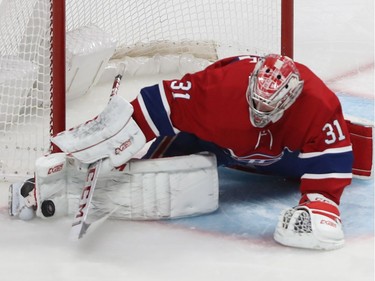 Montreal Canadiens goaltender Carey Price stops a shot versus the New York Islanders, during second period NHL action in Montreal on Tuesday December 03, 2019.