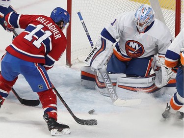 Montreal's Brendan Gallagher (11) lets go of a point blank shot on New York Islanders goaltender Thomas Greiss, during second period NHL action in Montreal on Tuesday December 03, 2019.