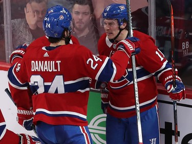 Brendan Gallagher (11) celebrates his goal with teammates Tomas Tatar (90) and Phillip Danault (24), after scoring on Colorado Avalanche goaltender Pavel Francouz, during second period NHL action in Montreal on Thursday December 05, 2019.