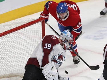 Phillip Danault (24) tries to put puck past Colorado Avalanche goaltender Pavel Francouz, during first period NHL action in Montreal on Thursday December 05, 2019.