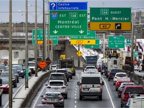Traffic heads east and west through the eastern sector of Lachine on Highway 20 in Montreal on Dec. 6, 2019.
