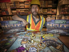 Montreal inventor David Loach, who has created the board game Construction & Corruption, with his board game laid out.