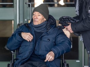Former Montreal police officer and Greenfield Park minor league hockey coach François Lamarre leaving the Longueuil courthouse December 19, 2019.