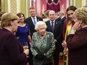 Queen Elizabeth II hosts a reception for NATO leaders at Buckingham Palace on Dec. 3, 2019, in London.