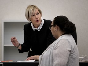 Lead coroner Andrée Kronstrom prepares to open the coroner's inquest into the June 2016 death of Mario-Nelson Boucher, in Montreal on Monday, June 18, 2018.