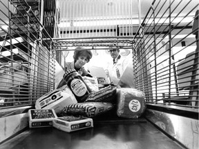 On Dec. 13, 1968, the Montreal Gazette reported about a new automated system at the Spot Supermarket in Dorval that spared shoppers the chore of unloading their groceries onto the conveyor belt at the checkout. This photo was among those taken for the story.