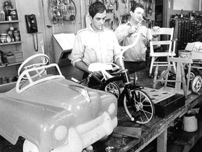 Maurice Lévesque, left, and Adrien Lachapelle, seen in December 1970, were members of the Montreal Fire Department, based at a station at Caty and Notre-Dame St. E. In their spare time, they and other firemen worked to repair toys, which were given to children in need.