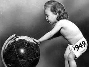 This photo from our archives is dated Dec. 31, 1948; the new year is often represented as a baby.