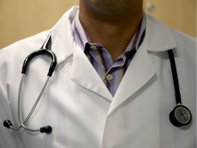 MIAMI, FL - JUNE 02:  A doctor wears a stethoscope as he see a patient for a measles vaccination during a visit to the Miami Children's Hospital on June 02, 2014 in Miami, Florida. The Centers for Disease Control and Prevention last week announced that in the United States they are seeing the most measles cases in 20 years as they warned clinicians, parents and others to watch for and get vaccinated against the potentially deadly virus.  (Photo by Joe Raedle/Getty Images) ORG XMIT: 495558035