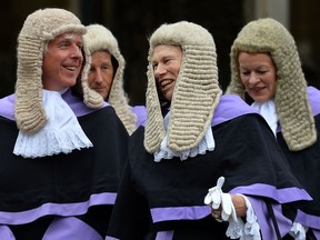 Judges leave after attending a service to mark the beginning of the legal year in England and Wales, at Westminster Abbey, in central London, on October 1, 2013. "Wigs as a style statement for men have disappeared except in British courts and some former colonies, where they are still worn by lawyers and judges," Joe Schwarcz writes.