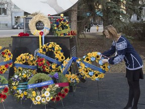 Wreaths are arranged into front of the Holodomor monument. The Ukrainian community commemorated Holodomor at the monument in front of Edmonton city hall on Nov. 23, 2019.