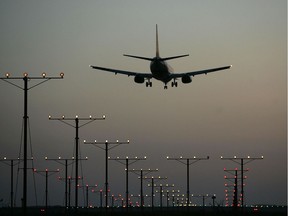 LOS ANGELES, CA - APRIL 15:  A jet comes in for landing at Los Angeles International Airport (LAX) on April 15, 2008 in Los Angeles, California. With skyrocketing fuel prices and a weak economy, US airlines are turning to mergers which could ultimately lead to higher fares through reduced flights and increased market power. US carriers emerged from a five-year slump in 2006 but with $35 billion in losses. In the latest merger move to save profits, Delta Air Lines Inc will buy Northwest Airlines Corp for more than $3 billion, creating the world's biggest airline. Recent profit challenges to the industry have lead to the shutdown of ATA, Skybus, and Aloha Airlines as well as bankruptcy for Frontier Airlines.