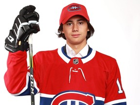 Russian defenceman Alexander Romanov poses for photo after being selected in the second round (38th overall) by the Montreal Canadiens at the 2018 NHL Draft at the American Airlines Center in Dallas.