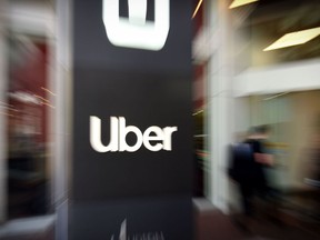 Uber logo is seen outside the company's headquarters in San Francisco, California.