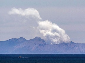 Steam rises from the White Island volcano following the December 9 volcanic eruption, in Whakatane on December 11, 2019.