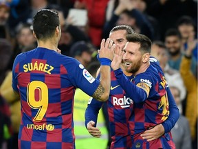Barcelona holding onto top spot is largely down to Argentina forward Lionel Messi (right) getting gross basic annual pay of more than US$64 million pounds including guaranteed image rights fees.