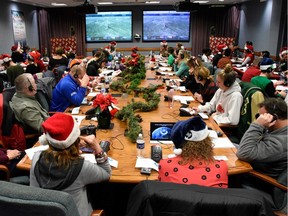 TOPSHOT - This photo released by the US Airforce, shows NORAD Tracks Santa Operation Center on Peterson Air Force Base, Colorado on December 24, 2019. - NORAD has been tracking Santa since 1955 when a young child accidentally dialed the unlisted phone number of the Continental Air Defense Command Operations Center, believing she was calling Santa Claus after seeing a promotion in a local newspaper.