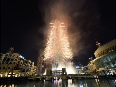 Fireworks explode at the Burj Khalifah, the worlds tallest building, on New Year's Eve to welcome 2020 in Dubai, on December 31, 2019. (Photo by - / AFP)