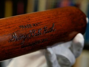 Babe Ruth's 500th home run bat is held by SCP Auctions president David Kohler before it goes up for auction in Laguna Niguel, Calif.