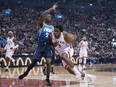 Toronto Raptors forward OG Anunoby (3) drives to the basket as Dallas Mavericks guard Delon Wright (55) tries to defend during the first quarter at Scotiabank Arena.