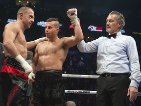 Montrealer David Lemieux is announced the winner for the super-middleweight division after fighting Ukraine's Max Bursak in Montreal on Sunday, Dec. 8, 2019.