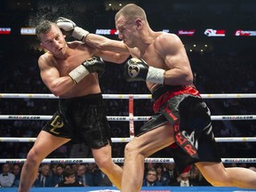 David Lemieux, left, makes his debut in the super-middleweight division as he fights Ukraine's Max Bursak in Montreal on Sunday, Dec. 8, 2019.