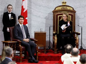 Governor General Julie Payette looks over at Prime Minister Justin Trudeau during the delivery of the Throne Speech in the Senate on Thursday.
