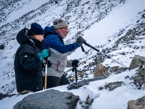 Teen Swedish climate activist Greta Thunberg visits the Athabasca Glacier with University of Saskatchewan water scientist Professor John Pomeroy at the Columbia Icefield in Jasper National Park, Alberta, on Oct. 22, 2019.