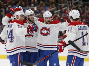The Canadiens celebrate a second-period goal by forward Phillip Danault (24) against the Edmonton Oilers at Rogers Place on Saturday, Dec. 21, 2019.