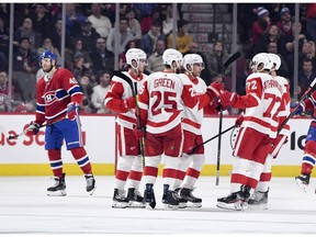 Detroit Red Wings defenceman Mike Green celebrates with teammates after scoring goal against the Canadiens during third period of NHL game at the Bell Centre in Montreal on Dec. 14, 2019. The Red Wings won the game 2-1.