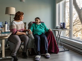 Patient Nicole L’Archevêque, right, chats with clinical co-ordinator Rose De Angelis at St. Raphael Palliative Care Home and Day Centre on Tuesday, Dec. 3, 2019.