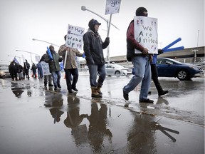 Swissport workers on the picket line at Trudeau Airport in Dorval.