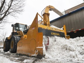 Snow blower clears snow on De Bienville St. during clearing operation in Montreal Thursday January 2, 2020.