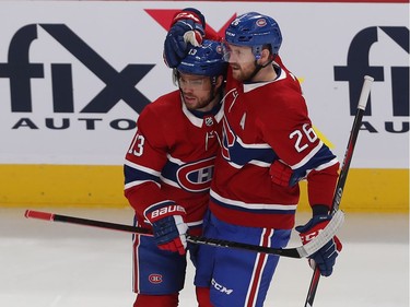 Montreal Canadiens Jeff Petry (26) celebrates his goal with teammate Max Domi (13) during first period NHL action in Montreal on Thursday Jan. 2, 2020.