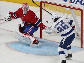 Tampa Bay Lightning's Nikita Kucherov scores on Montreal Canadiens goaltender Carey Price during the first period in Montreal on Thursday Jan. 2, 2020.