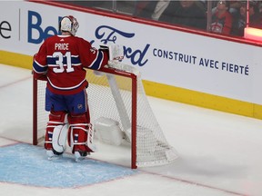 Canadiens goaltender Carey Price looks at the back of his net after a goal by the Tampa Bay Lightning's Nikita Kucherov during the first period at the Bell Centre in Montreal on Jan. 2, 2020.