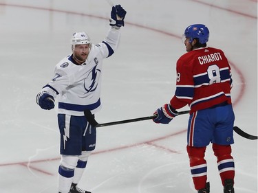 Tampa Bay Lightning's Steven Stamkos (91) celebrates his goal next to Montreal Canadiens' Ben Chiarot (8).