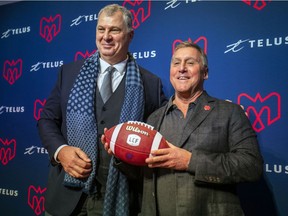 Canadian Football League commissioner Randy Ambrosie, left, with new Alouettes co-owner Gary Stern during Monday's press conference.